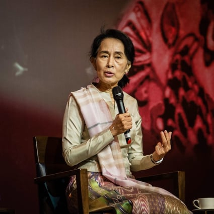 Myanmar opposition leader Aung San Suu Kyi addresses the Myanmar Club in Singapore on Sunday. Photo: EPA