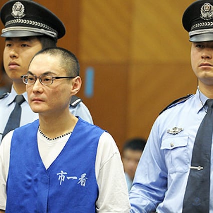 Han Lei stands trial at the Beijing No 1 Intermediate People's Court in Beijing on Wednesday. Photo: Xinhua