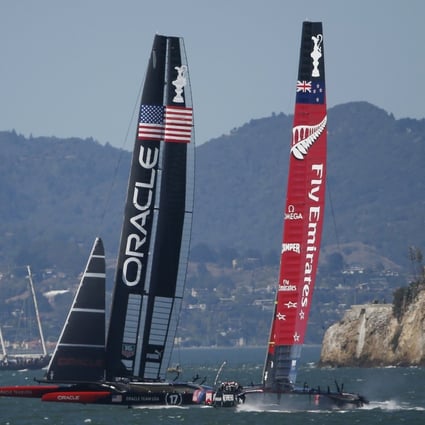 Oracle Team USA overtakes Emirates Team New Zealand. New Zealand is hinting at future America's Cup funding. Photo: Reuters