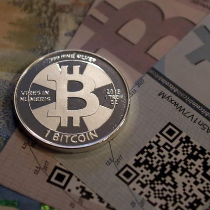 A real-life bitcoin minted by American enthusiast Mike Caldwell. The actual currency is only used electronically. Photo: Reuters