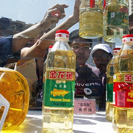 Gutter oil is made from waste oil and meat-product waste. Photo: AP