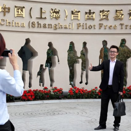 The mainland banking regulator sent questionnaires to foreign banks asking them why they were hesitant to open branches in the Shanghai free-trade zone. Photo: EPA