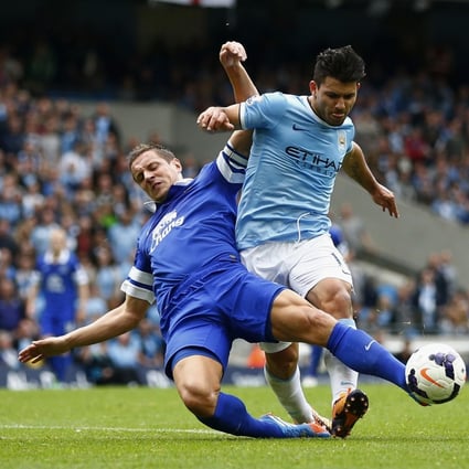 Manchester City's Sergio Aguero being challenged by Everton's Phil Jagielka, who has backed Leighton Baines to stand in for Ashley Cole. Photo: AFP 