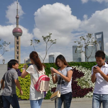 Mobile phone subscribers on the mainland can look forward to theoretical internet download speeds of up to 100 megabits per second when 4G arrives. Photo: AFP