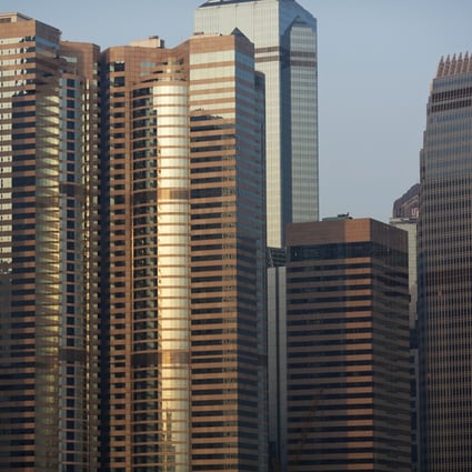 Mainland insurers and banks are expected to form a new buying force in Hong Kong's weak investment property market. Photo: Bloomberg