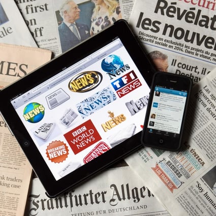 Newspapers' answer to the internet is to make their news available online for reading on digital gadgets such as tablets and smartphones. Photo: AFP