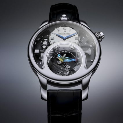JAQUET DROZ The Charming Bird: In celebration of the brand's 275th anniversary and its prowess with automatons and miniatures, this patent-pending timepiece features an exact reproduction of a songbird that moves, flaps its wings and opens its beak to chirp, thanks