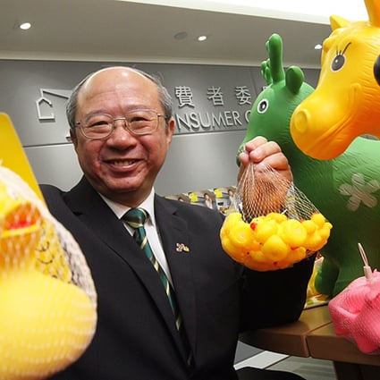 Professor Michael Hui King-man, chairman of the Consumer Council's publicity and community relations committee, displays toy samples containing extremely high levels of phthalates. Photo: KY Cheng