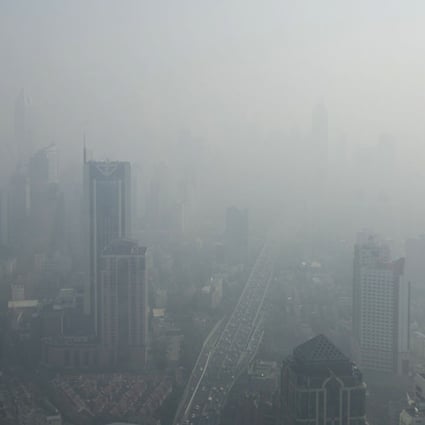 Buildings are seen through thick haze in downtown Shanghai. Photo: Reuters