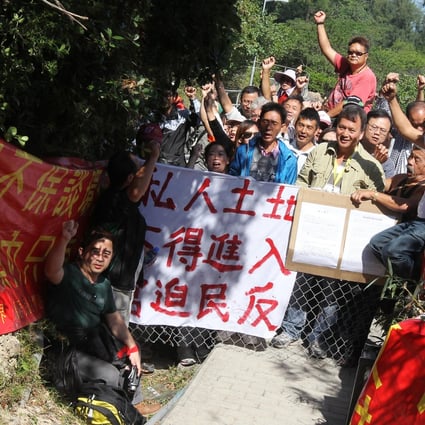 Villagers protesting during Trailwalker. Photo: K. Y. Cheng