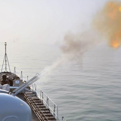 A ship gun fires during last month's exercises. Photo: SCMP