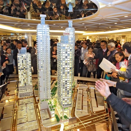 People flock to see mock-ups of The Avenue in Wan Chai, one of several recent property developments that have attracted investors and mainlanders back into the market with stamp duty subsidies. Photo: SCMP