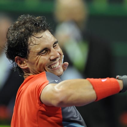 Rafael Nadal  celebrates victory over  Gael Monfils in the Qatar Open final. Photo: Xinhua
