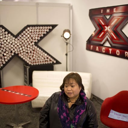 Filipino helper Rose Fostanes prepares to take part in a rehearsal in Tel Aviv forThe X Factor Israel, which has made her a star. Photo: AP