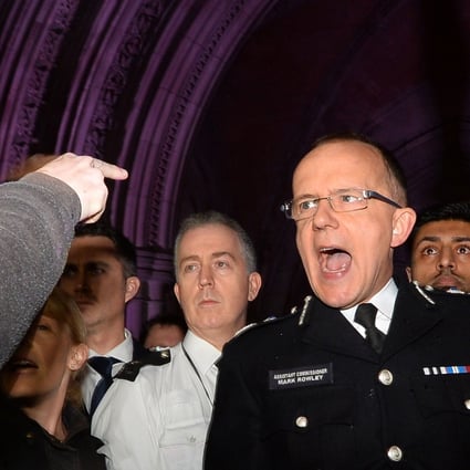 Assistant Commissioner Mark Rowley addresses the media and the public outside the Royal Courts of Justice in London. Photo: AFP