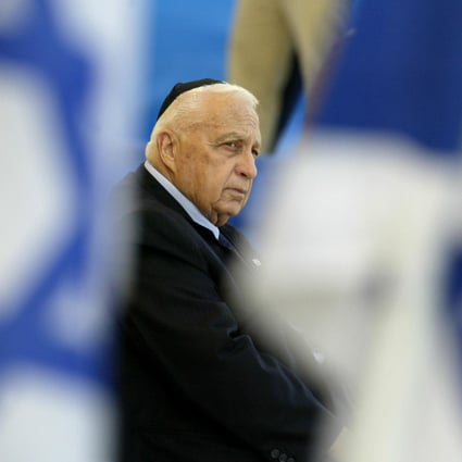 As prime minister in 2004, Ariel Sharon attends a memorial ceremony. Photo: AP