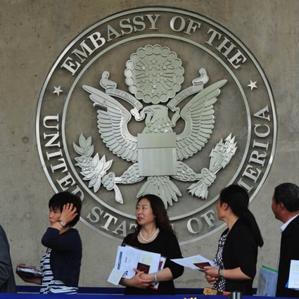 Chinese citizens wait to submit their visa applications at the US Embassy. Photo: AFP