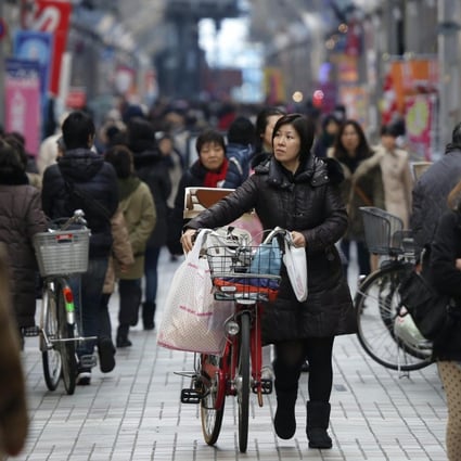 Japan's economy continues to recover, with consumer spending helping to push inflation towards a 2 per cent target. Photo: EPA