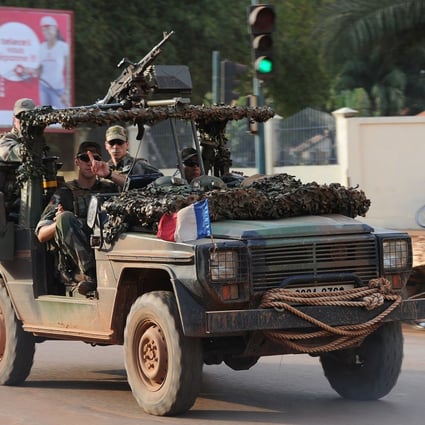 French soldiers patrol in a street of Bangui in November. Photo: AFP