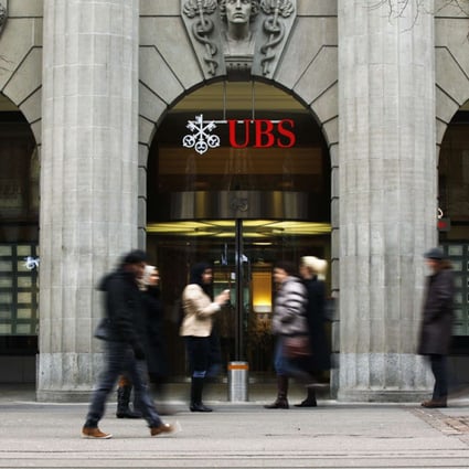 Third of Swiss banks seek US tax amnesty