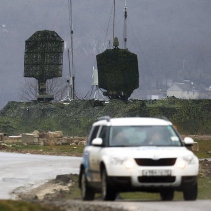 A vehicle drives past an anti-aircraft defence point near Sochi in southern Russia. Sochi will host the  Winter Olympic Games from February 7 to 23. Photo: Reuters