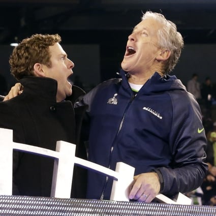 Seattle head coach Pete Carroll (right) celebrates with general manager John Schneider after winning Super Bowl XLVIII. Photo: AP