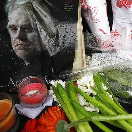 A memorial for movie actor Philip Seymour Hoffman is displayed in front of his apartment building in New York. Photo: Reuters