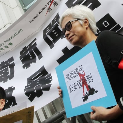 Members of The Hong Kong Journalists Association and the Hong Kong Press Photographers Association march to Liaison Office to the Central People's Government in the Hong Kong to condemn the attacks on Hong Kong Journalists in Beijing. Photo: K. Y. Cheng