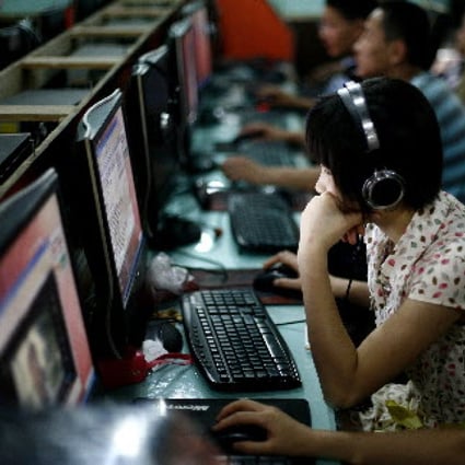 Customers at an internet cafe in Beijing - a city with the mainland's second fastest internet connection. Photo: AP