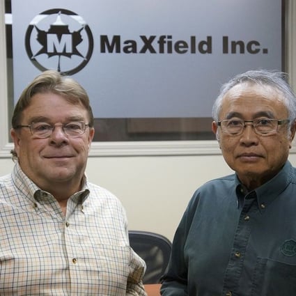 Tony Giasson (left), president and chief operating officer, and Budi Setiawan, board chair and CEO