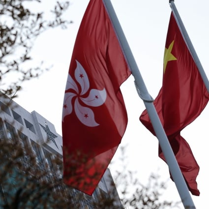 The Hong Kong and China flags fly outside the PLA Central Barracks. The break-in prompted concerns from Beijing. Photo: David Wong/SCMP