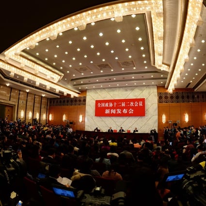 Media gather for a press conference on the Chinese People's Political Consultative Conference in Beijing. Photo: Xinhua
