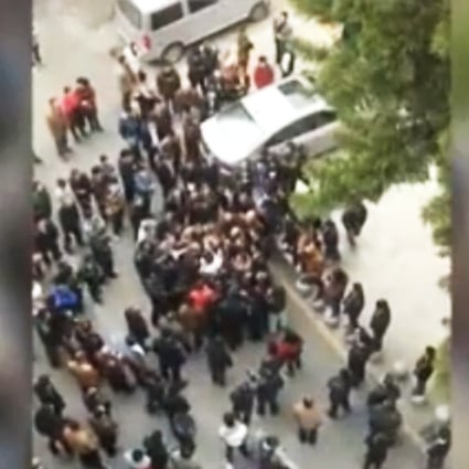 Screen grab of a Sina.com video of the confrontation outside the hospital in Chaozhou. Photo: SCMP Pictures 