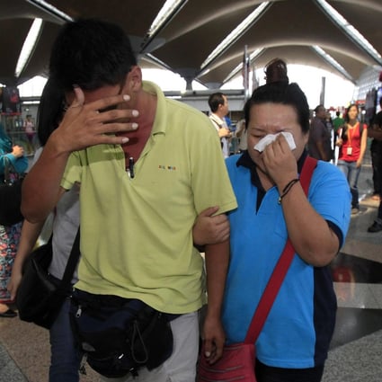 Relatives of the passengers onboard wait anxiously for news at the airports in Kuala Lumpur and Beijings. Photo: AP