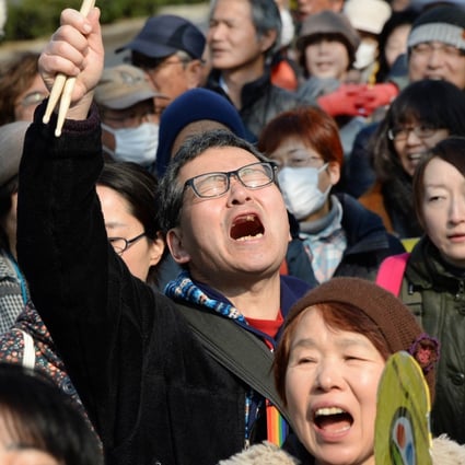People shout slogans as they march during an anti-nuclear power plant demonstration in Tokyo. Photo: AFP