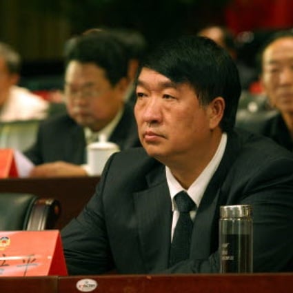 Shen Peiping photographed at a meeting in Yunnan. Photo: AFP 