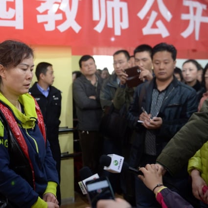 A managment personnel of the Litian Kindergarten explains reason for illegal administering drugs to preschoolers in the Qilihe District of Lanzhou. Photo: Xinhua
