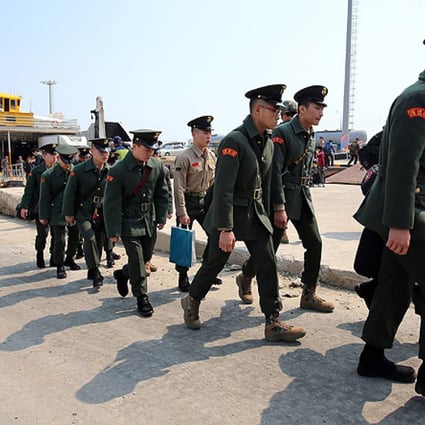 South Korean marines arrive on Baengnyeong, the island where the unmanned drone crashed, on Tuesday. Photo: Reuters