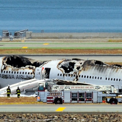 The Asiana Airlines Boeing 777 on the runway at San Francisco International Airport after the crash landing on July 6, 2013, Photo: AFP