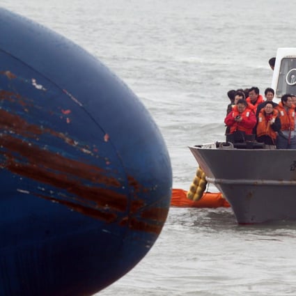 Relatives of missing passengers visit the area where the ferry sank off Byeongpung island. Photo: AFP