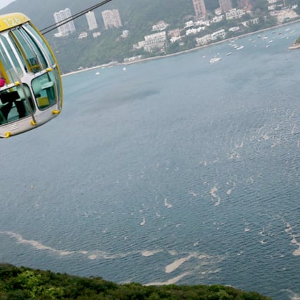 A red tide in Deep Water Bay on Monday, as viewed from a cable car at Ocean Park. Photo: Nora Tam
