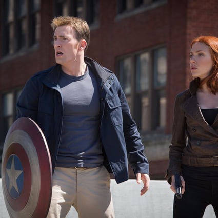 Captain America: The Winter Soldier, starring Chris Evans, left and Scarlett Johansson, remains top of the US box office for a third week. Photo: Marvel Studios/MCT