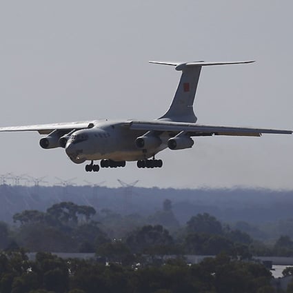 A Chinese Ilyushin IL-76 lands in Perth after returning from the search for missing Malaysia Airlines Flight 370. Photo: AP