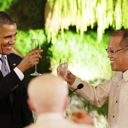Obama toasts with President Benigno Aquino during a dinner whose guest list included many politicians with checkered pasts. Photo: Reuters