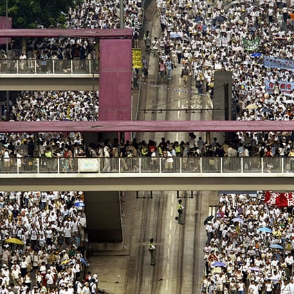 Demonstrators marking the seventh anniversary of the handover crowd into Wanchai on July 1, 2004 . Photo: SCMP Pictures