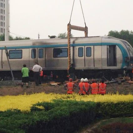 The train derailed during testing of an overground section of Beijing subway Line 4.