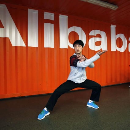 A shadow-boxing performance during an open day at Alibaba Group's office in Hangzhou. The firm is leading the way to improving China's logistics infrastructure. Photo: AP