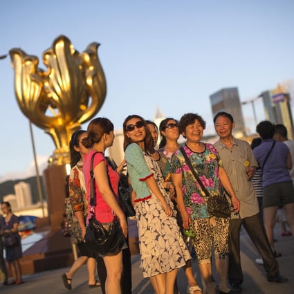 Immigration Department figures show the number of mainland tourists dropped 1.5 per cent year on year during the three-day national holiday. Photo: Bloomberg
