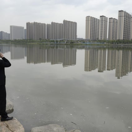 Ratings agency Moody's has downgraded the mainland property to negative from stable. Photo: Reuters