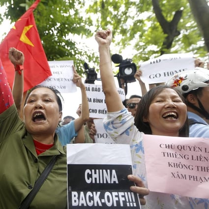 As Vietnamese protest against China's actions in disputed waters, today's workers may become tomorrow's jobless.Photo: EPA